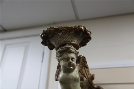 A pair of 19th century Italian carved and painted parcel gilt wall scones, 20in.